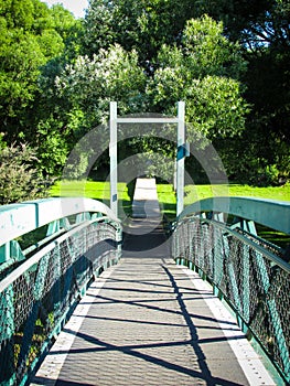 Metal bridge of pedestrian traffic over the Meander River in Deloraine, Tasmania