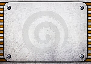 Metal brushed plate on iron perforated background