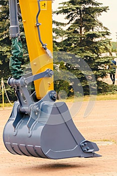 Metal bucket of an excavator close-up