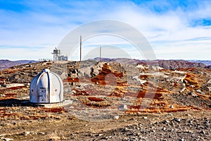 Metal bunker with meteorologic station and autumn greenlandic or photo