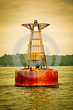 Metal buoy on the sea