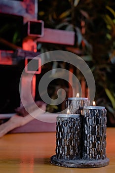 Metal candlestick with blurry background photo