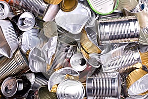 Metal cans and tins prepared for recycling photo