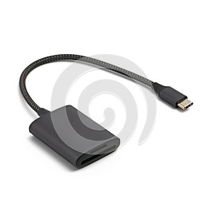 Metal card reader with type-Ñ cord on white background, shallow depth of field