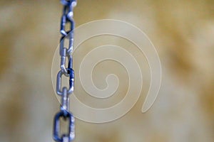 Metal chain on a blurred background