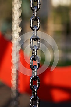 Metal chain with red background