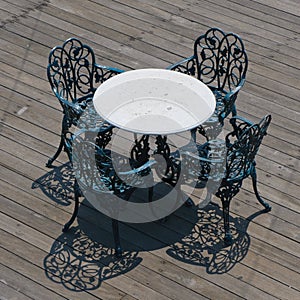Metal chairs and round table