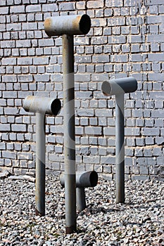 Metal chimneys and ventilation pipes with wind deflectors