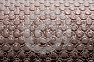 Metal coating and textured floor and backdrop