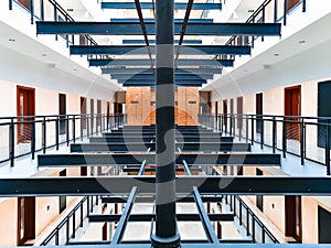 Metal constructions between long terraces with small apartments