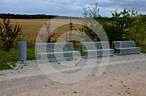 From metal constructions to climbing plants and vines is a sitting terrace of rough stone paving chipped cubes. metal gray furnitu