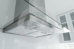 Metal cooker hood in luxury kitchen.