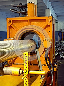 Metal corrugation forming machine. photo