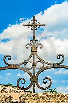 The metal cross on top of the Mission Concepcion church in San Antonio, Texas