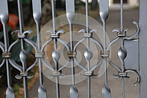 Metal curly fence in the park