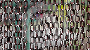 Metal curtain on the entrance of bird park. The door made of chain link to prevent the bird fly away from the bird cage