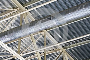 Metal designs of a roof and pipe of ventilation.