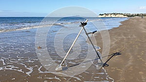 Metal detecting on a beach