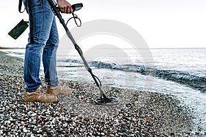 Metal detector coil in action above the ground