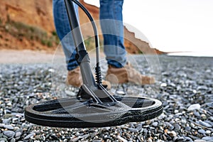 Metal detector coil in action above the ground