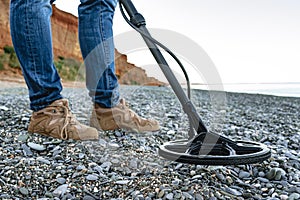 Metal detector coil in action above the ground