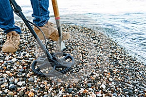 Metal detector coil in action above the ground