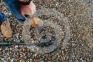 Metal detector coil in action above the ground