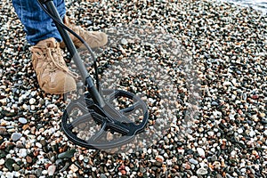 Metal detector coil in action above the ground