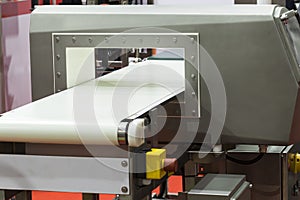 metal detector for food industrial ; show white conveyor belt