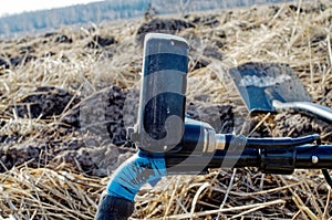 Metal detector lying in the field