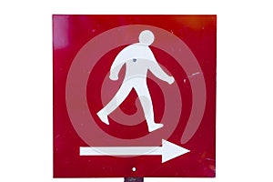Metal directional sign, with white painted figure walking, a