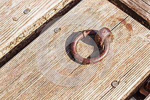 Metal dock ring on a wooden pier