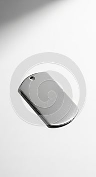 Metal dog tag lying on a