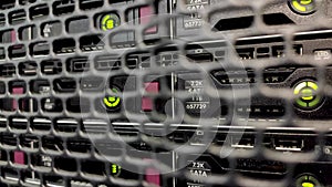 The metal door of the server rack. Hard drives behind the honeycombs. Video contains noise.