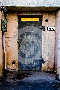 Metal Door to Concrete Bunker for Explosives. photo