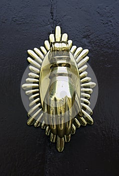 Metal doorknob or knocker