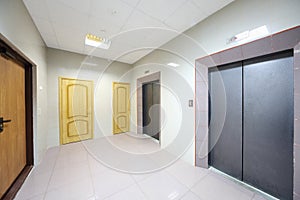 Metal doors to elevators and offices