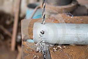 Metal drilling with a large drill