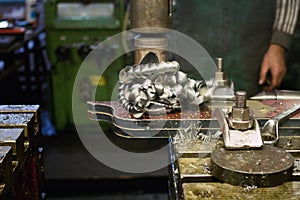 Metal drilling in metal workshop