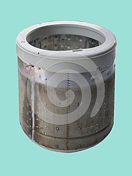 Metal drum of the washing machine on blue sreen background