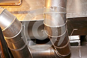 Metal duct work for heating and air conditioning. photo