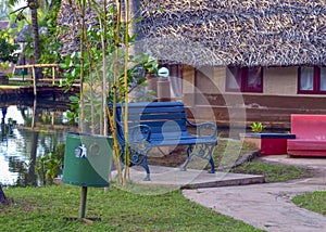 Metal dustbin and chair