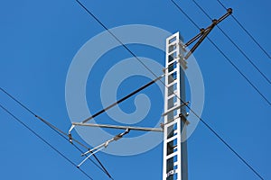 Metal electric pole on sky background