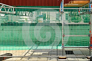 Metal fence blocking construction site