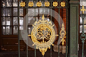 metal fence gold blazon architecture detail outdoor