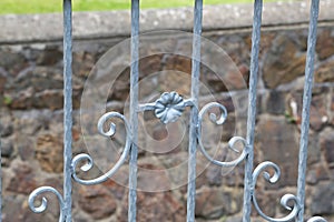 Metal fence. Metal curly fence in the park