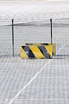 Metal fence and Restricted Area Sign