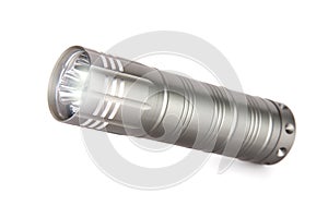 Metal Flashlight, isolated on white background