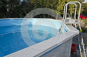 Metal frame swimming pool ready for a bath
