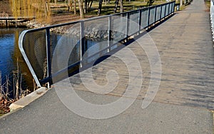 Metal galvanized railing on the bridge. The filling is formed by a metal mesh of expanded metal. transparent railing better view o